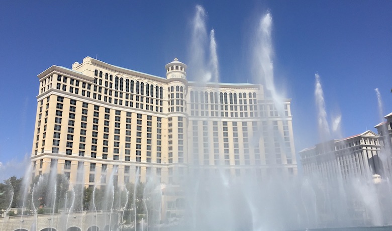 The Bellagio Fountain show with the Bellagio Hotel and Casino in the background.