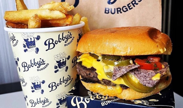A screenshot of burgers and fries from Bobby's Burgers by Bobby Flay in Caesars Palace Hotel and Casino Las Vegas.
