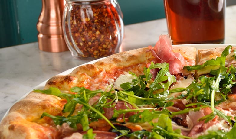 A screenshot of pizza from Flour and Barley - Brick Oven Pizza restaurant in The Linq Hotel and Casino Las Vegas.