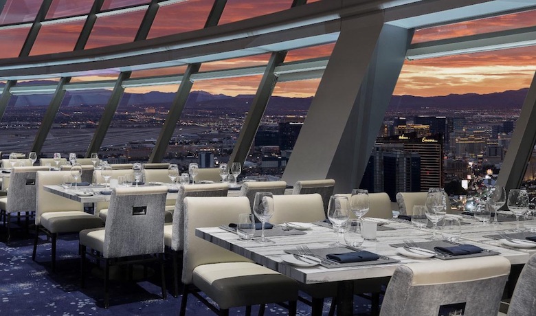 A screenshot of the dining area and view from Top of the World restaurant in The Stratosphere Hotel and Casino Las Vegas.