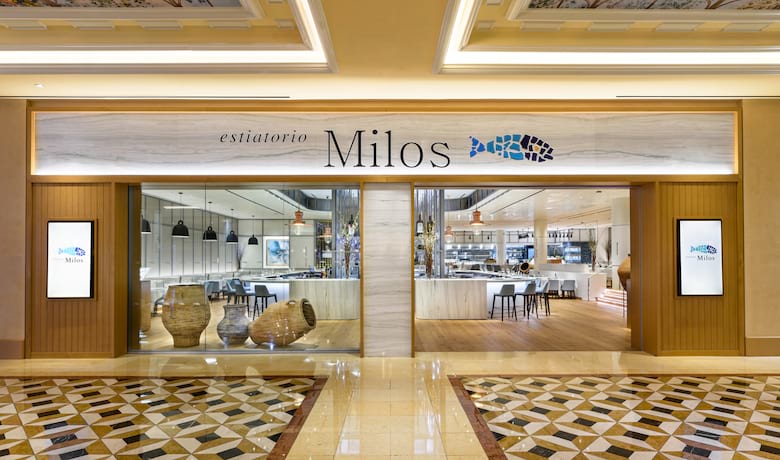 A screenshot of the entrance to estiatorio Milos Seafood Restaurant in the Venetian Hotel and Casino Las Vegas.