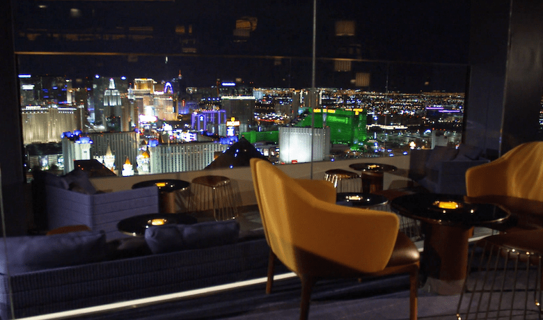 A screenshot of the dining area and view at Skyfall Panoramic Bar & Lounge in the Delano Hotel and Casino Las Vegas.